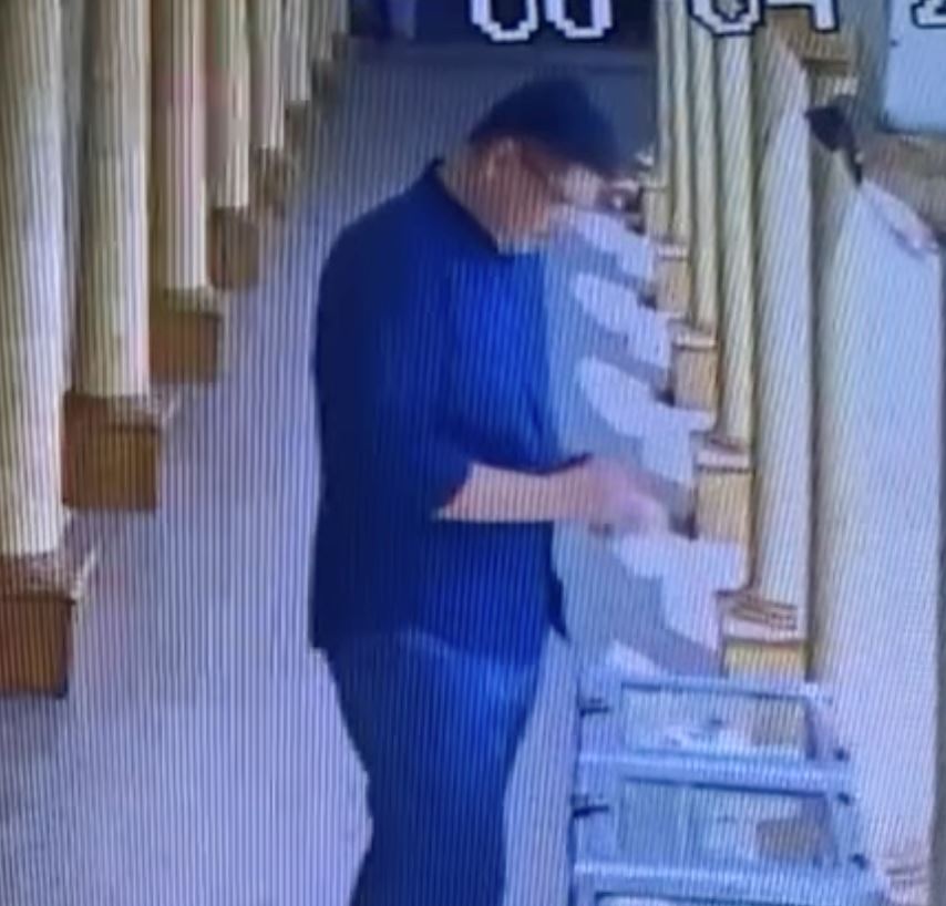 man in indonesia caught placing his own bank qr code stickers on donation boxes