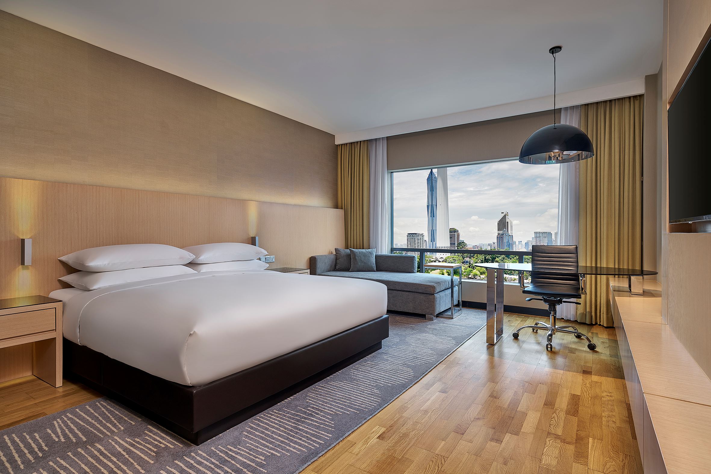 a bedroom with a view at Renaissance KL