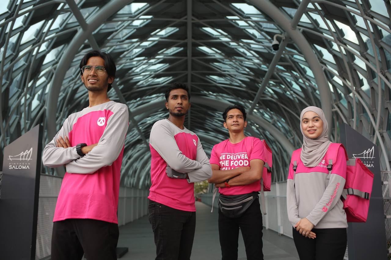 4 foodpanda riders in uniform