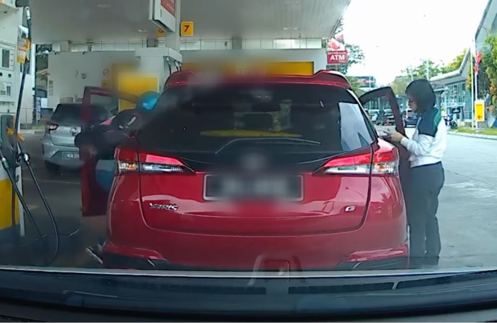 woman robbed at petrol station, didn’t realise a man was waiting for her to unlock her car