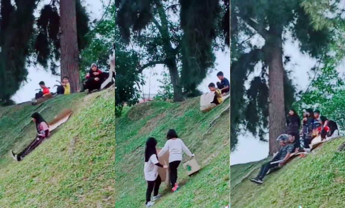 man “scolds” children sliding dangerously down a hillside, ends up playing with them instead!