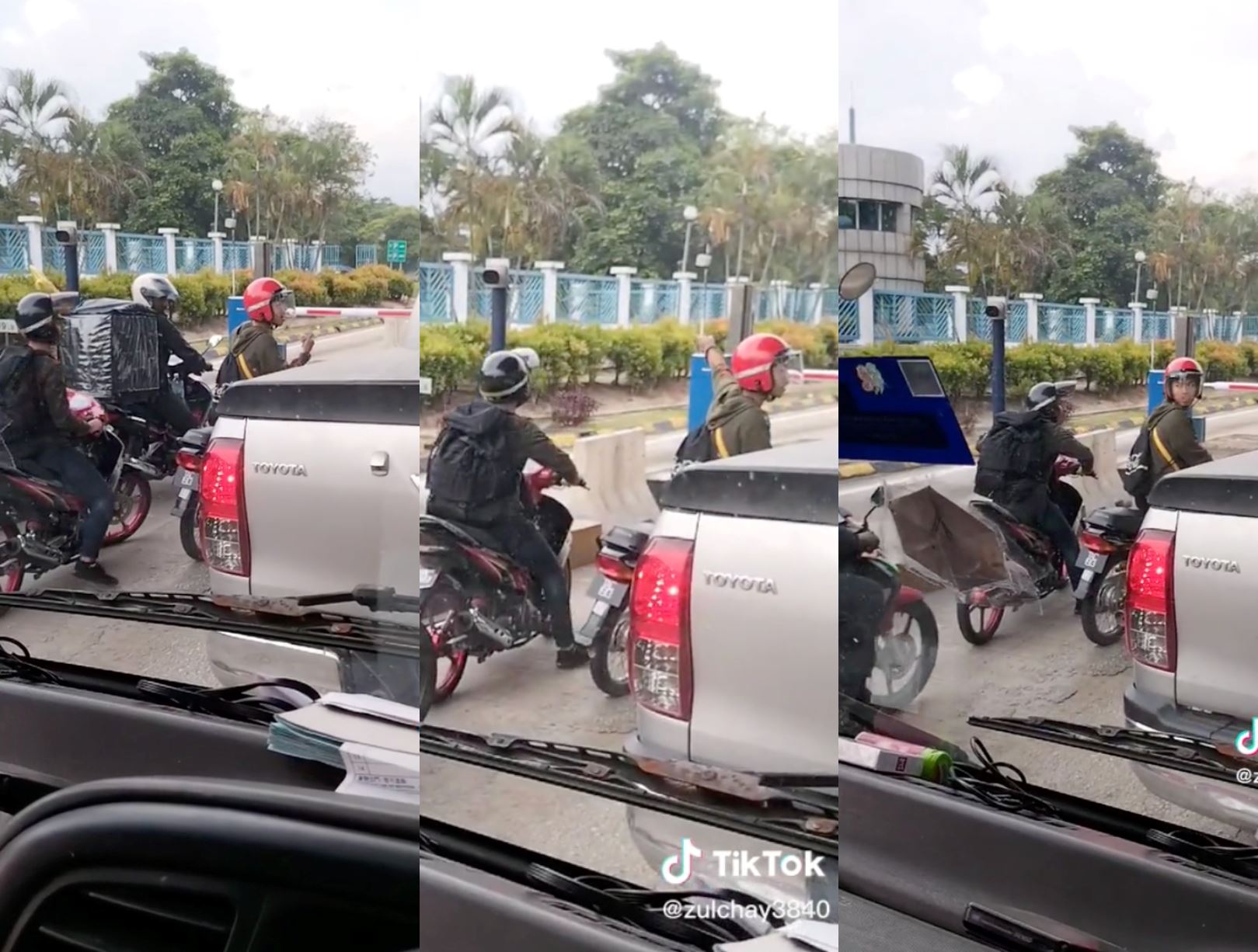 car refuses to let motorcycles go through toll barrier as they already have designated motor lanes
