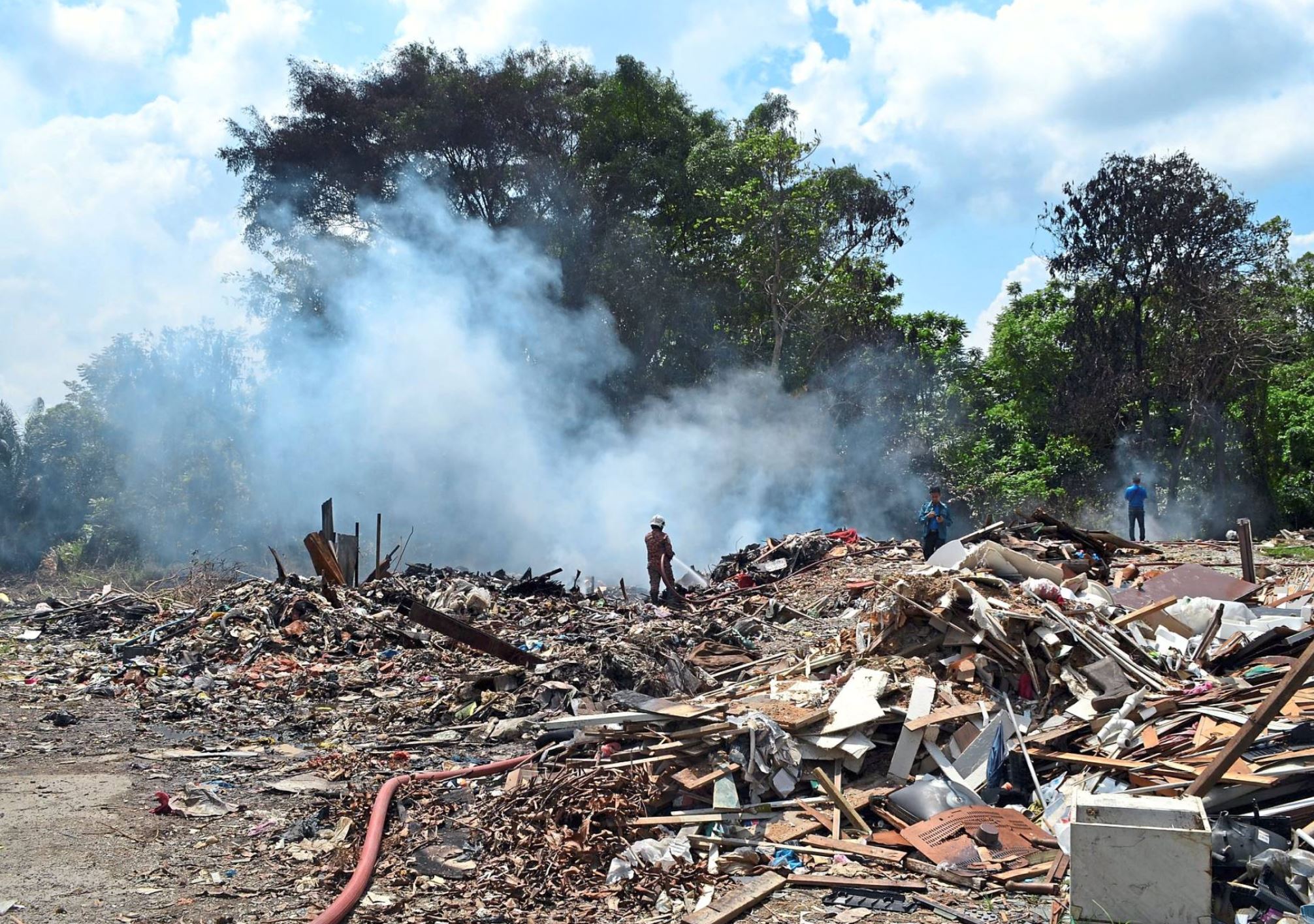 the dangers of open burning in malaysia's hot weather