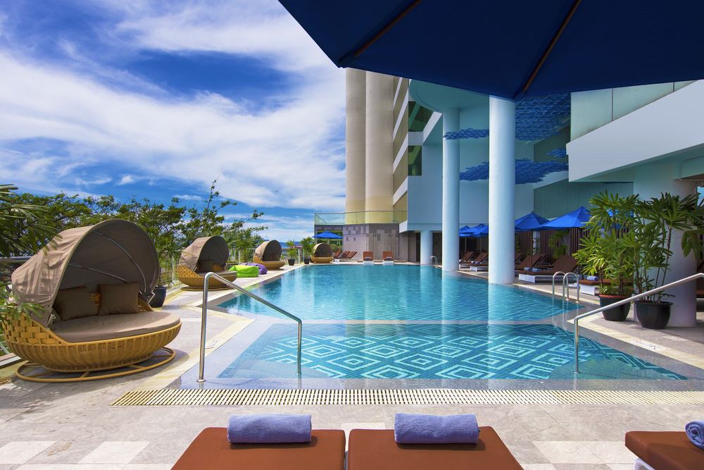 Outdoor swimming pool at Le Meridien Kota Kinabalu