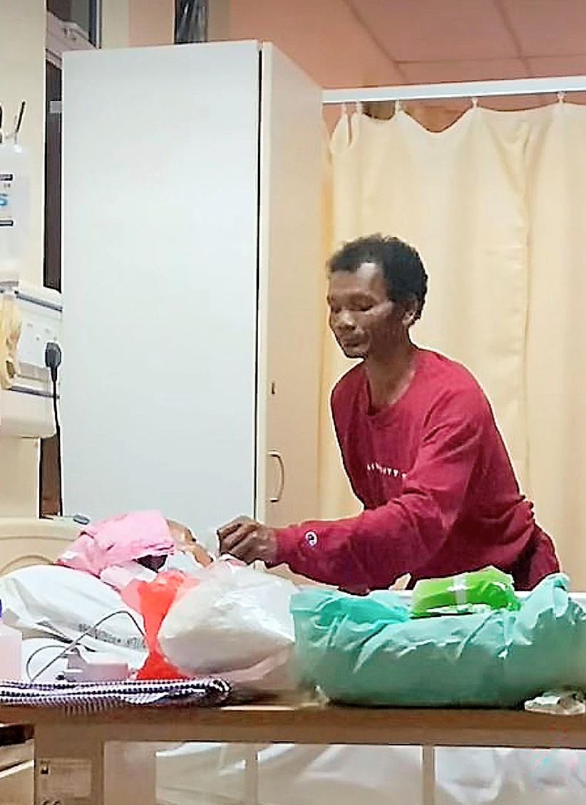 orang asli man spends 2 months at the hospital taking care of his wife who is in a coma