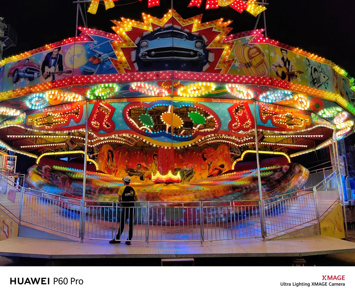 Night view of colorful theme park ride