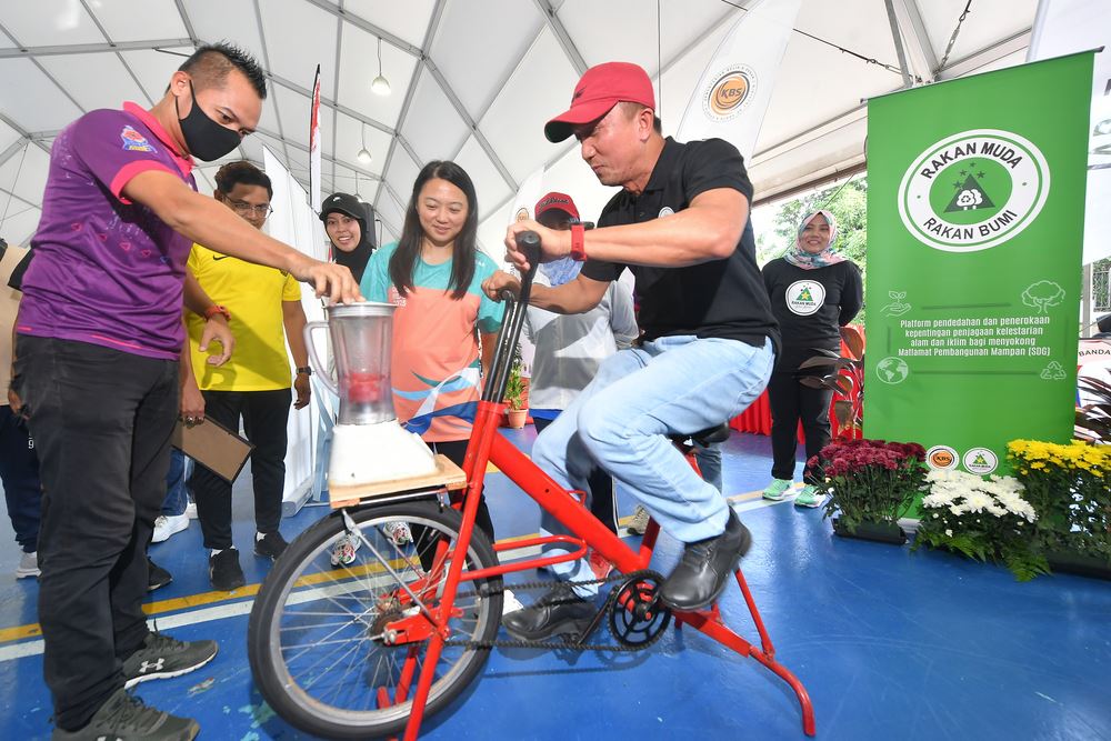 A man participating in a Science experiment
