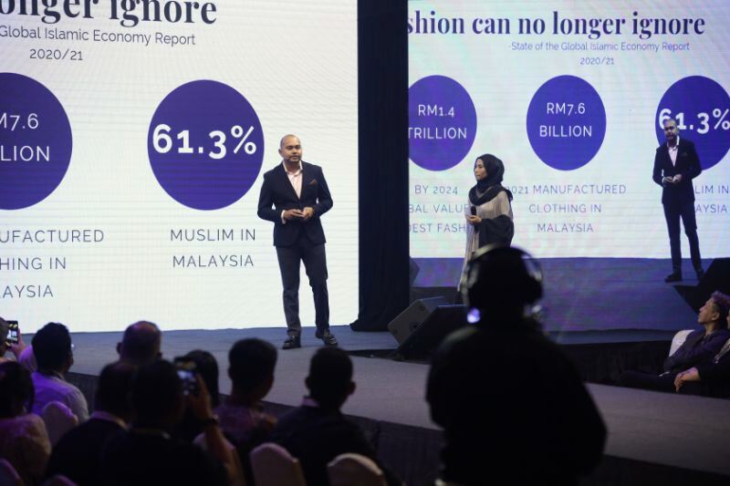 Man making his pitch on stage