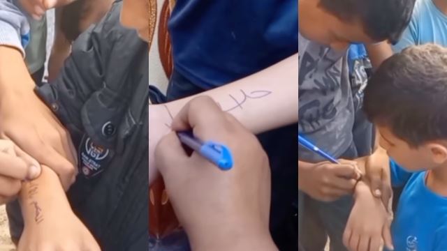 mudahkan keluarga untuk mengecam, kanak-kanak palestin sepakat tulis nama di tangan
