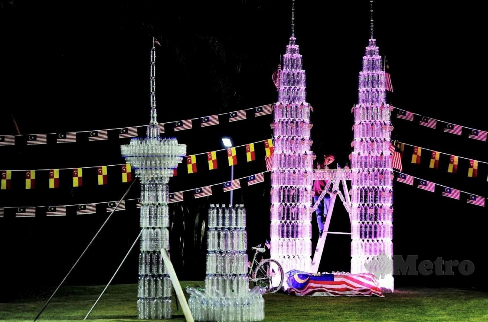 klcc in tanjong karang? 15-year-old student builds twin towers using plastic bottles!