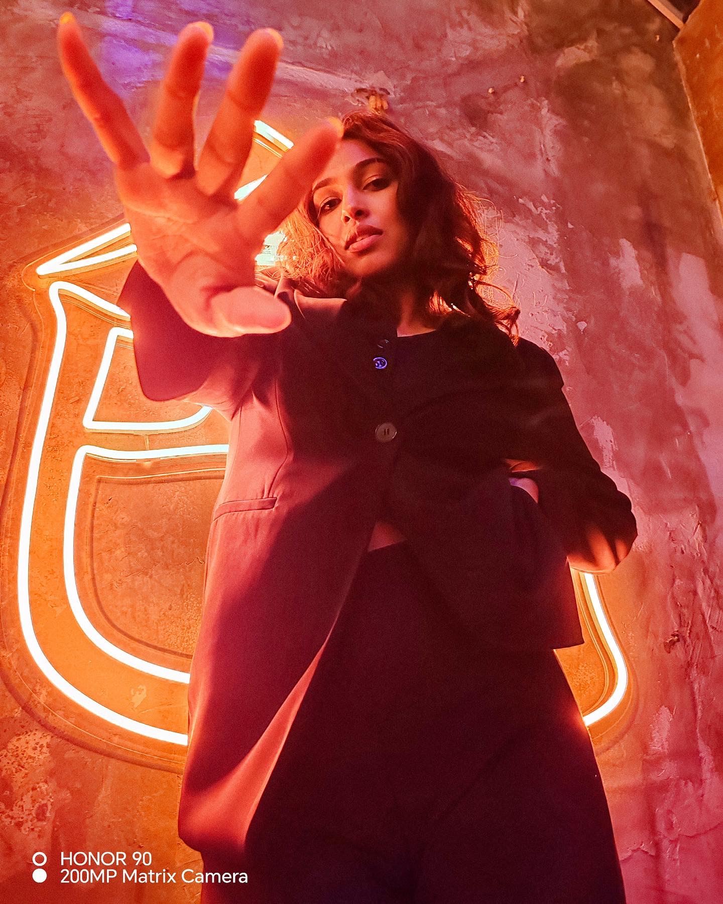 a girl posing with her gaze into the camera