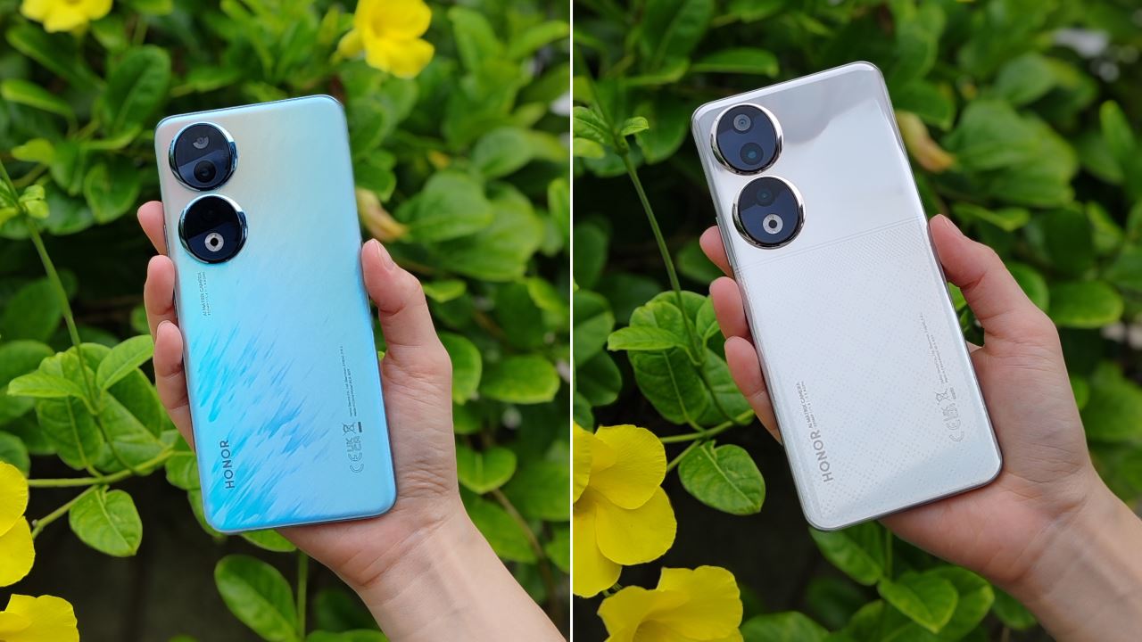 two hands holding two phones each