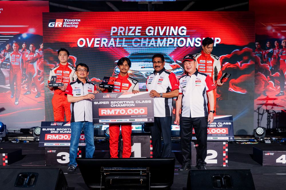 race car drivers on stage