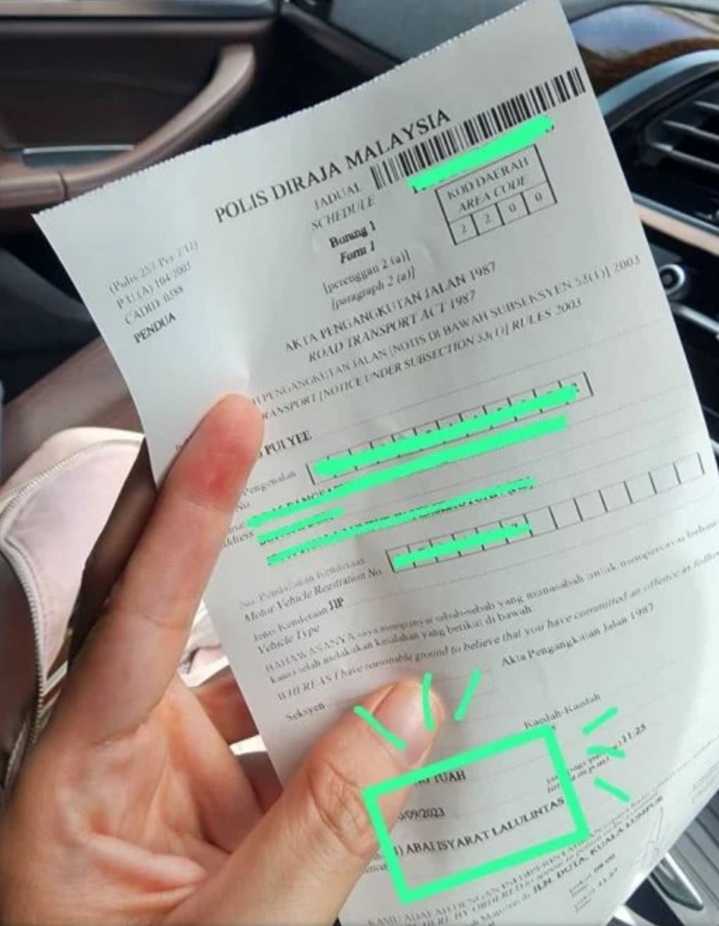 大马网友等交通灯停白线上接罚单！罚款高达rm2k！