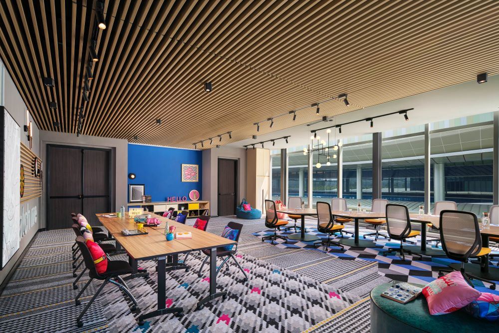 A vibrant meeting room with bold colours