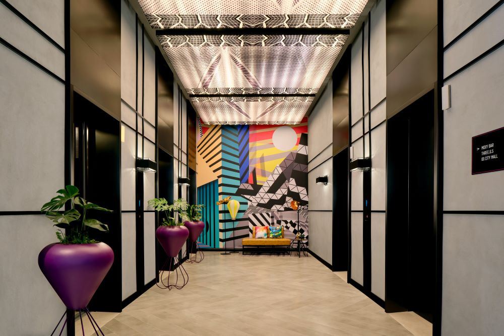 Lift area with stylish decoration and wall at Moxy Putrajaya