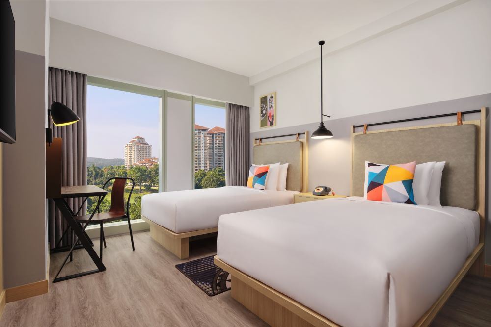 Twin golf view bedroom at Moxy Putrajaya