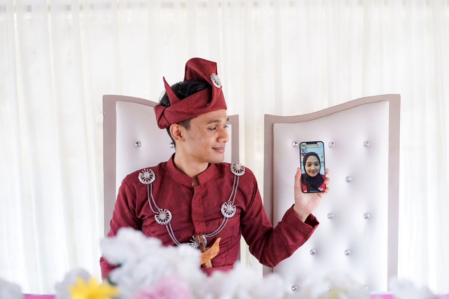 malaysian bride attends her own wedding via video call after she was hospitalised