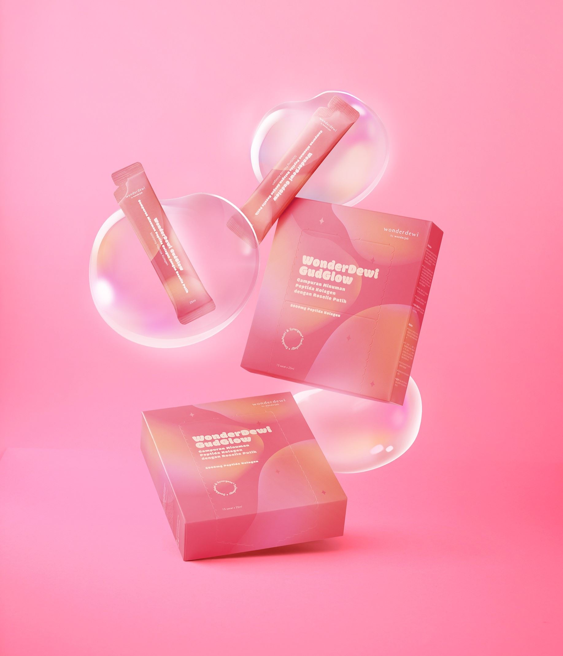 a box of WonderDewi GudGlow with sachets floating