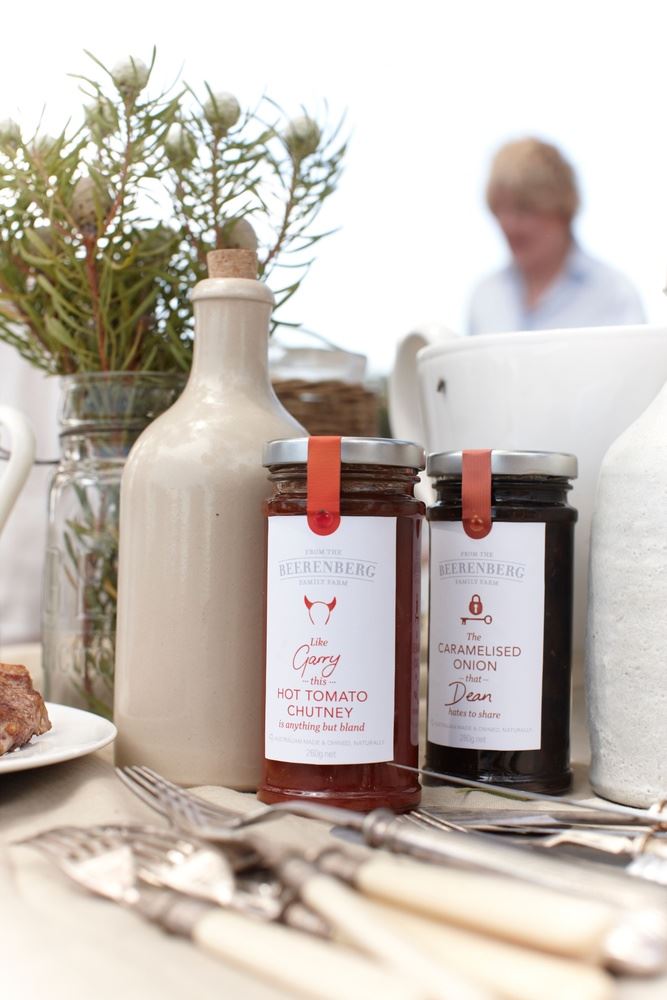 wo jars of chutney and caramelised onions on a table