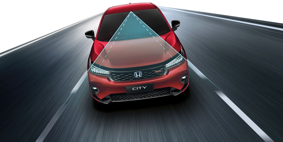 Red Honda City with Honda SENSING safety features