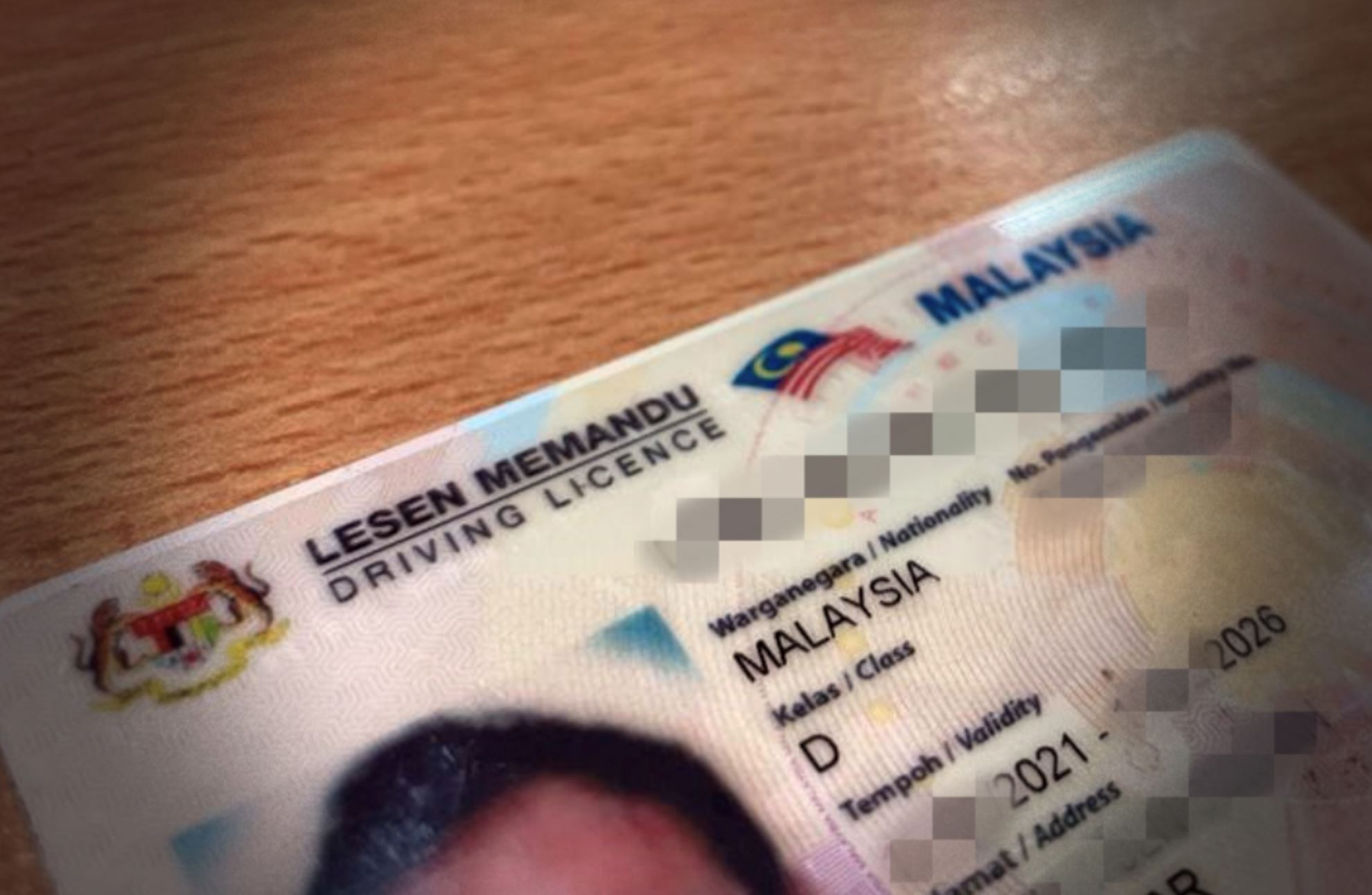 anthony loke: malaysians may need to pay for physical driving licence cards from next year