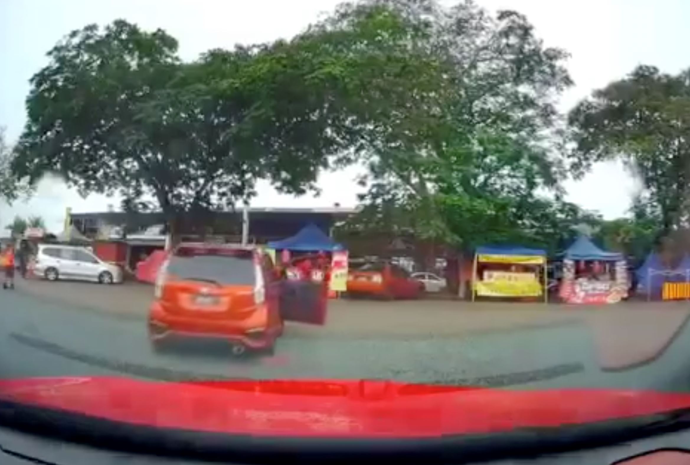 man stops for food, forgetting handbrake, and sparks roadside accident