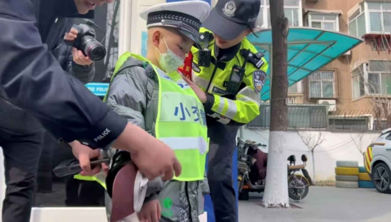 boy fighting rare cancer has his dream of being a traffic policeman come true for a day!