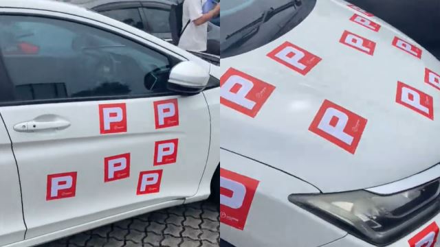 driver goes all out with ‘p’ stickers, covering entire car to announce newbie status