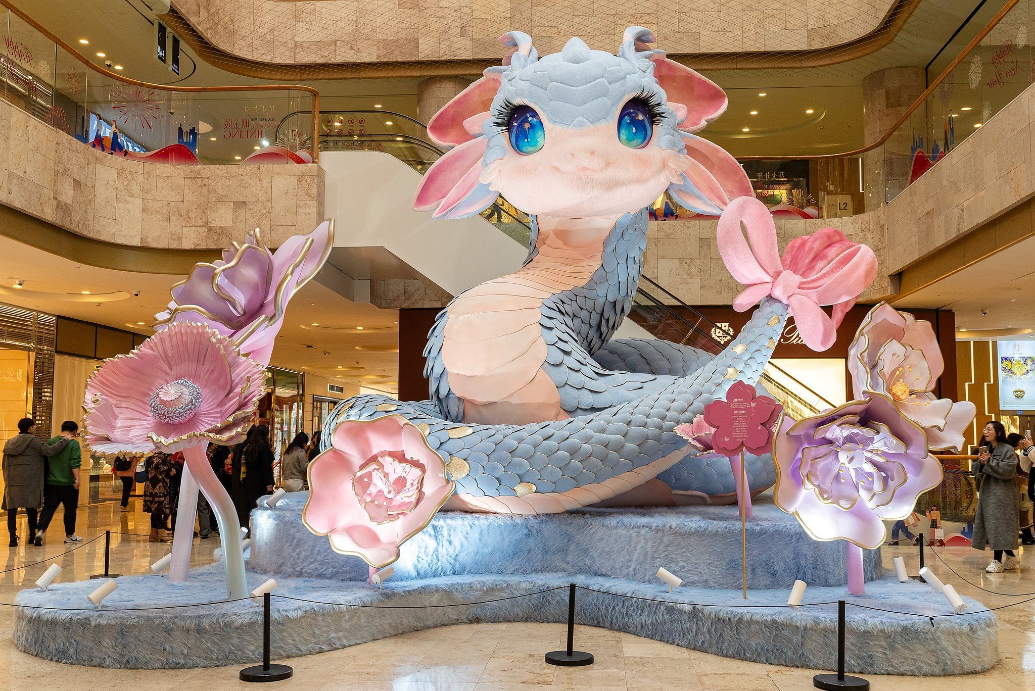cny decorations in china malls go viral with pokémon-like snake sculptures