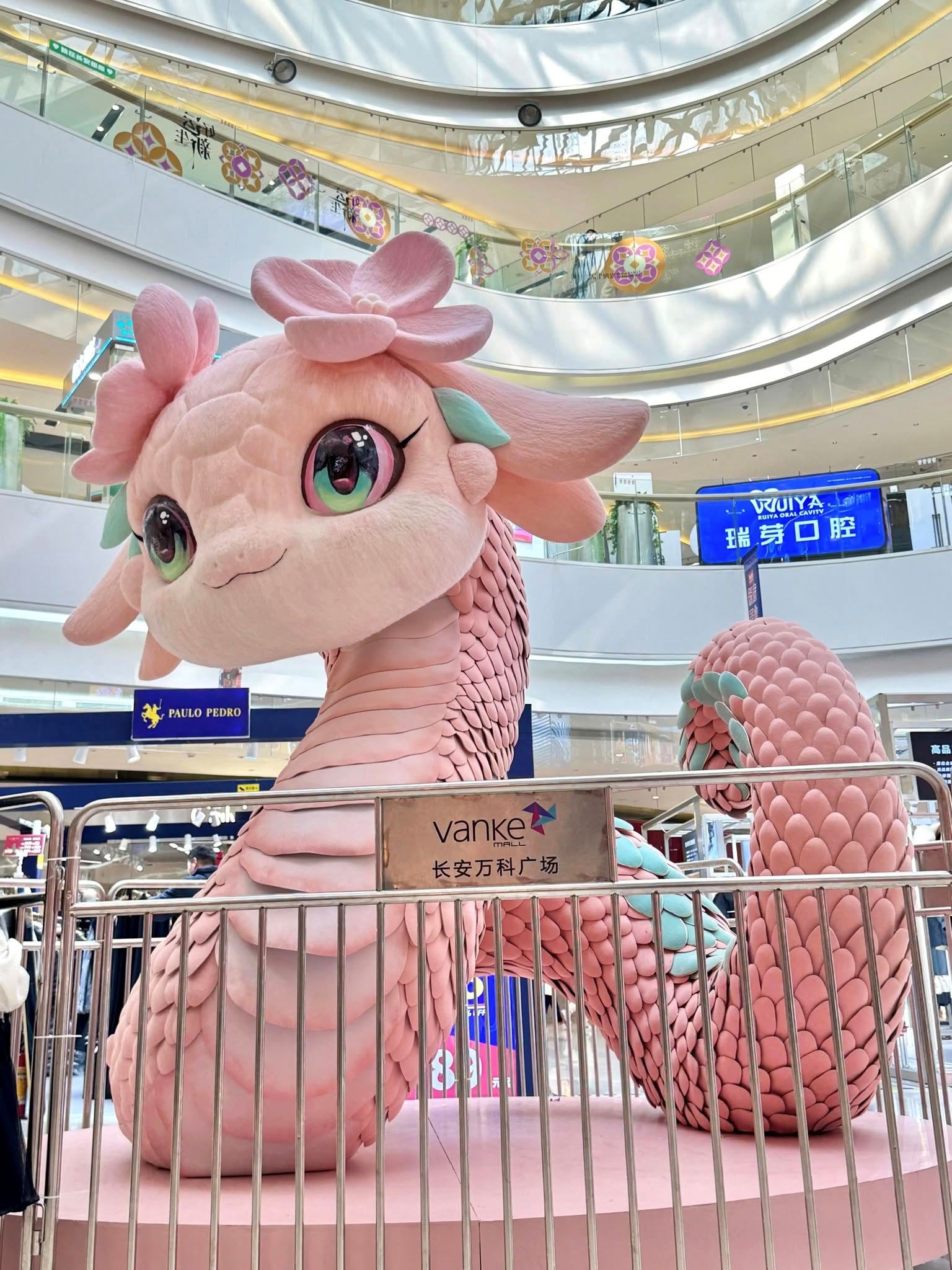 cny decorations in china malls go viral with pokémon-like snake sculptures