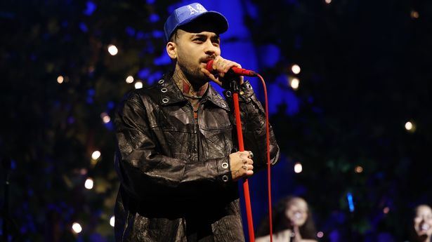zayn malik and louis tomlinson reunite at los angeles concert
