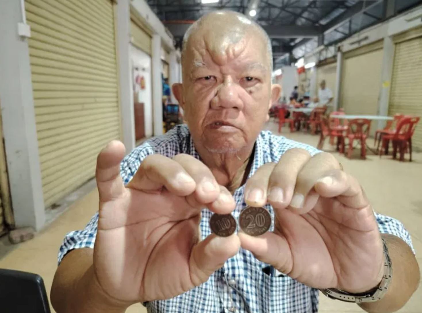 perak shop refuses to accept 'too black' coin, leaving elderly customer confused
