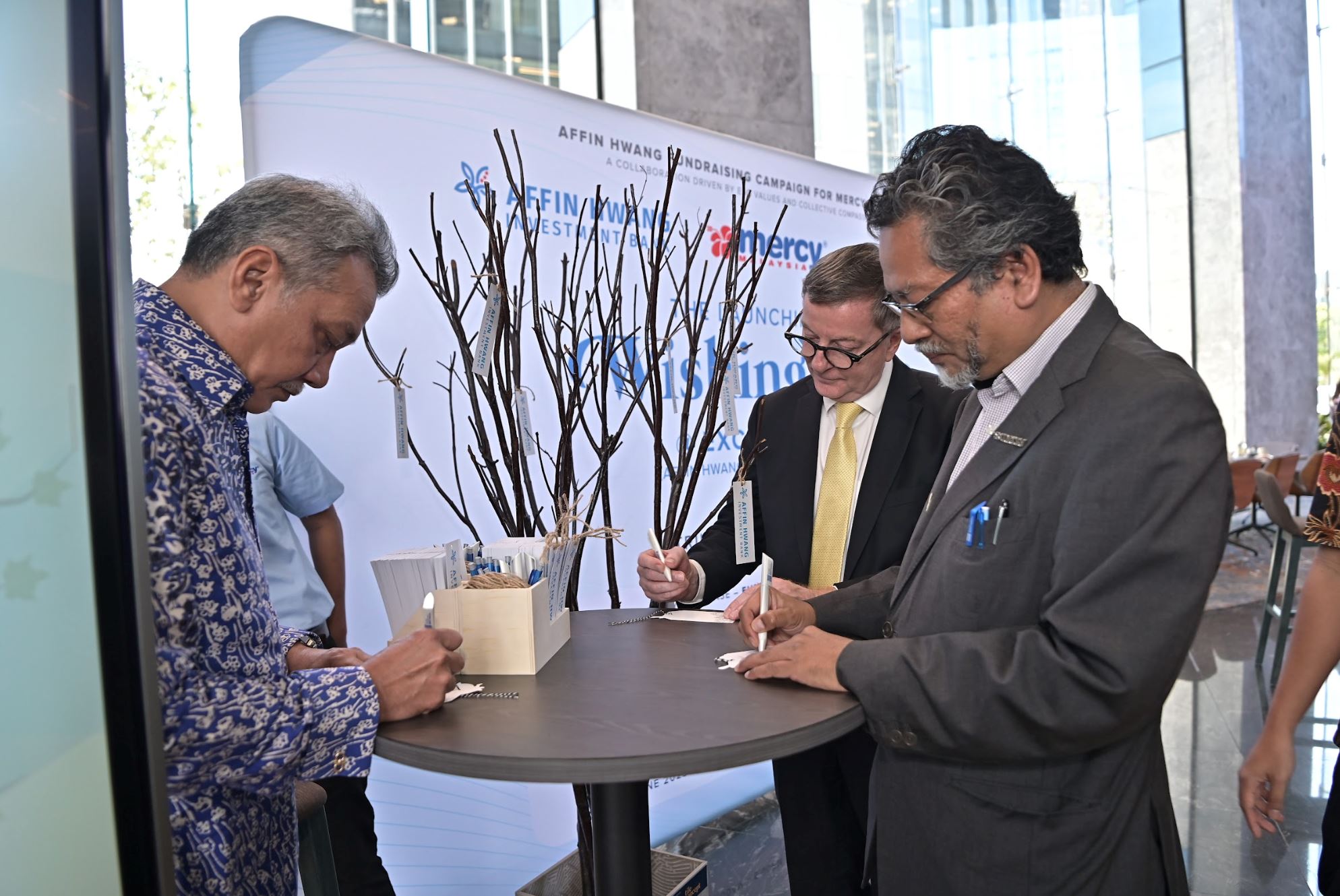 wishes take root at exchange 106: inaugural wishing tree @ exchange 106 debuts with affin hwang and mercy malaysia