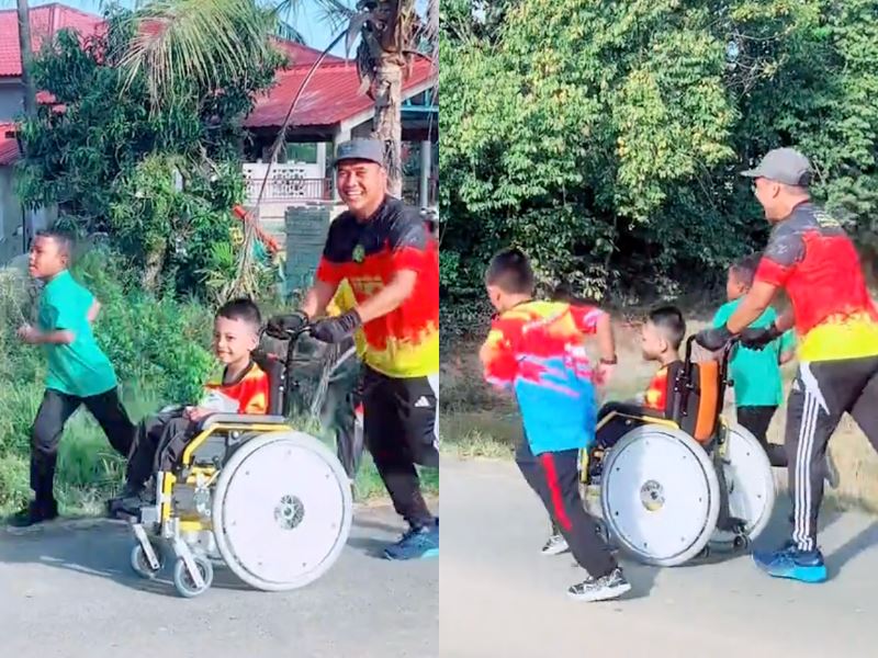 malaysian teacher melts hearts by pushing student in wheelchair, making sure he feels included