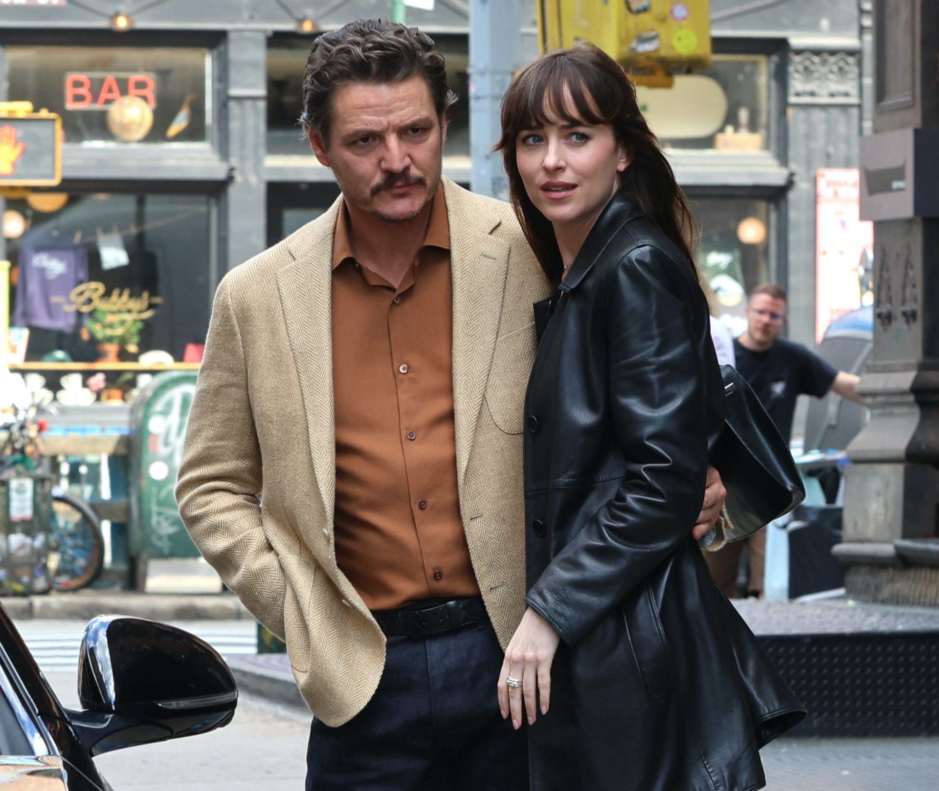 help! dakota johnson is stuck between pedro pascal and chris evans in ‘materialists’