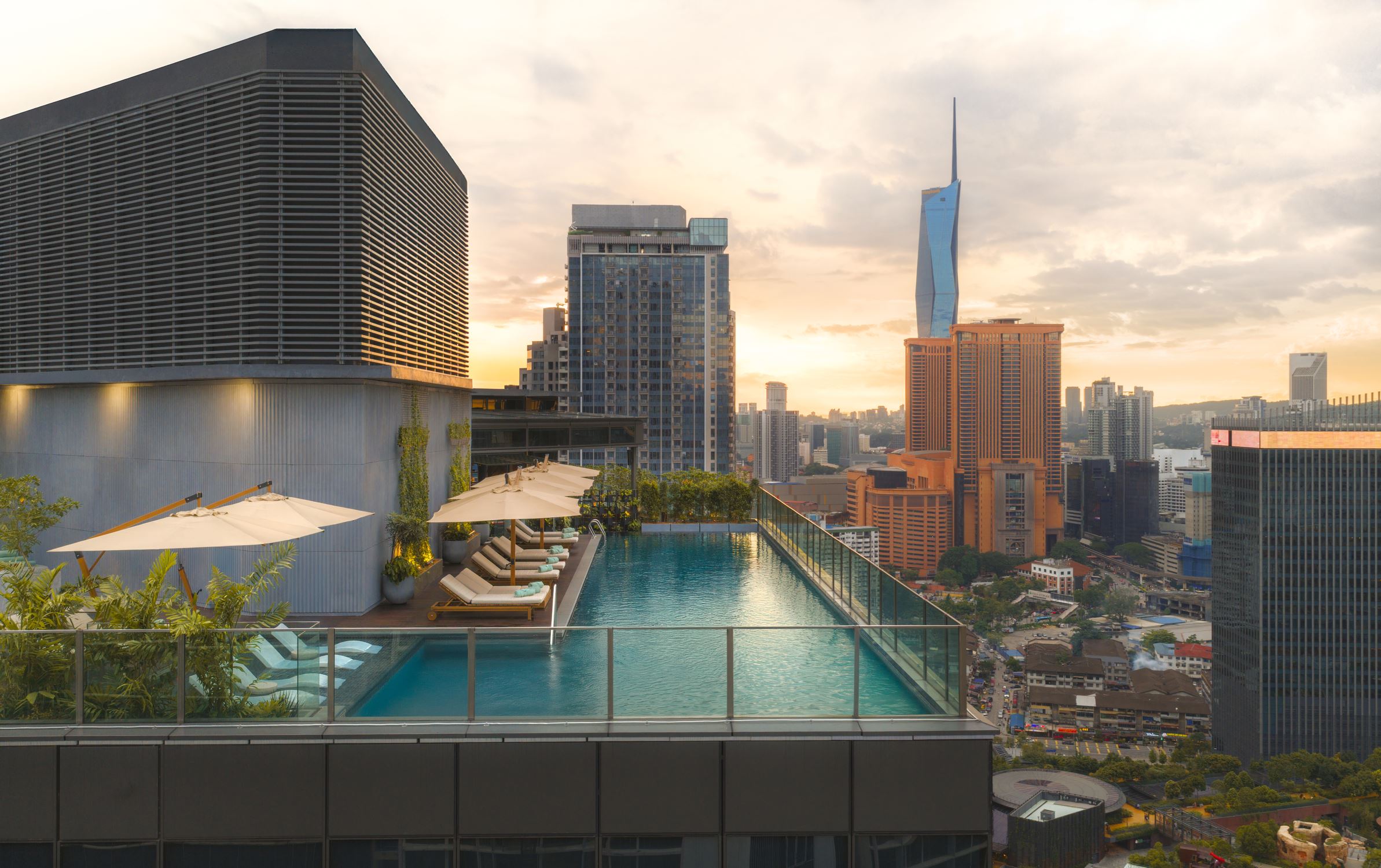 The rooftop pool at Kimpton Naluria Kuala Lumpur hotel in TRX
