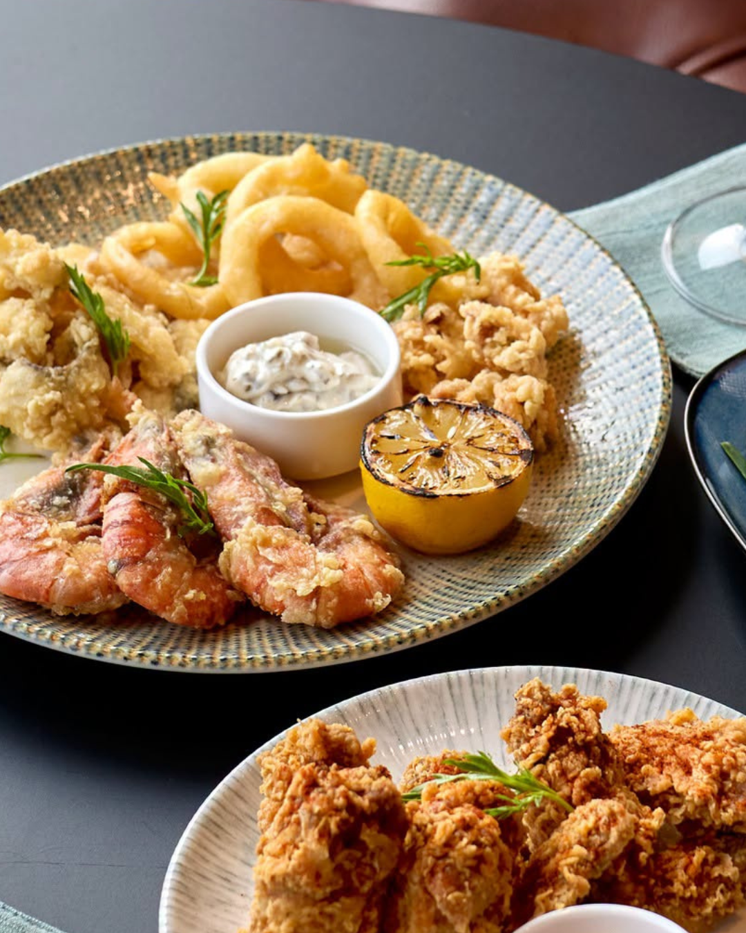 A serving of seafood and chicken