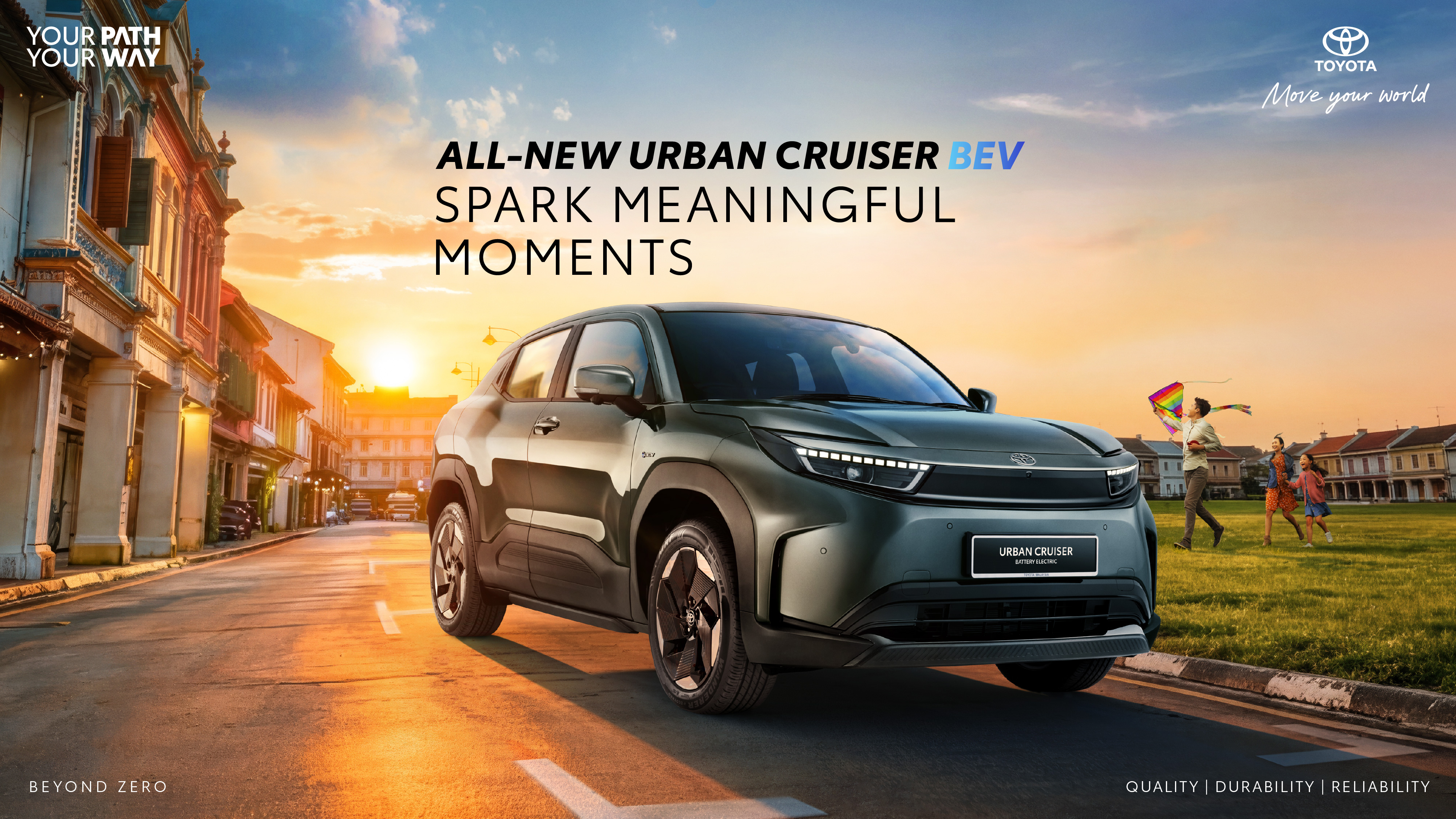 One car parked by a park and some buildings