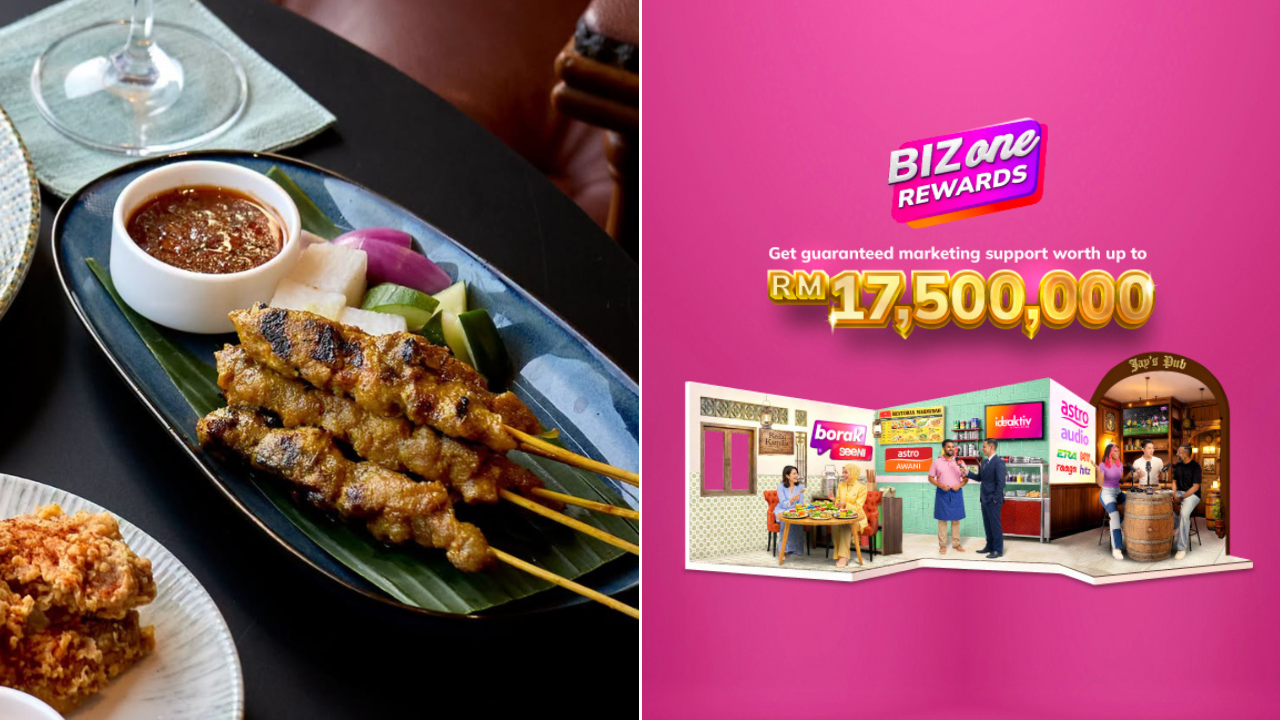 A plate of satay and other foods on a table