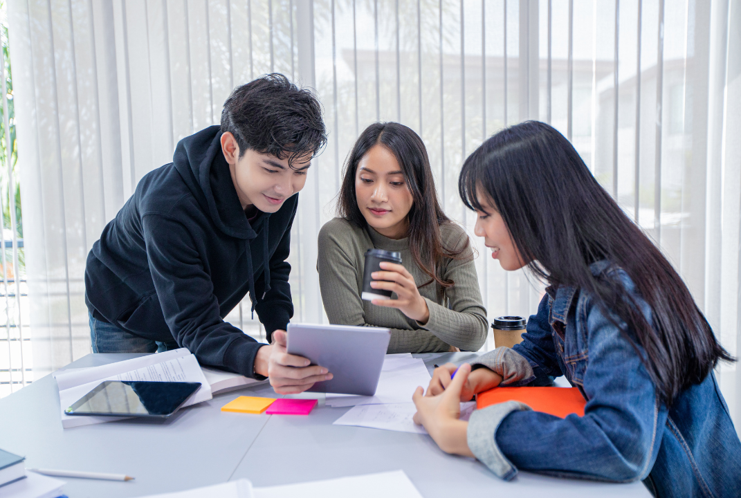 A group of students having a discussion together