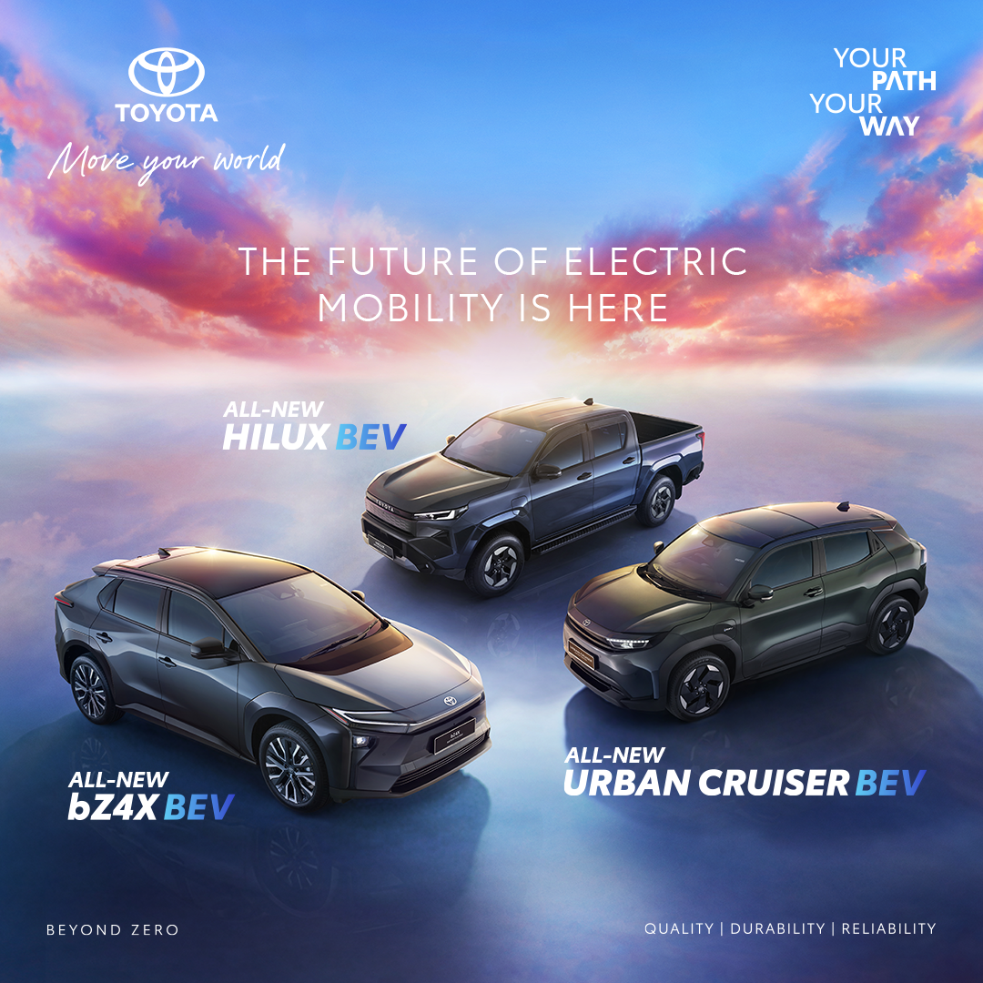 Three cars parked facing each other