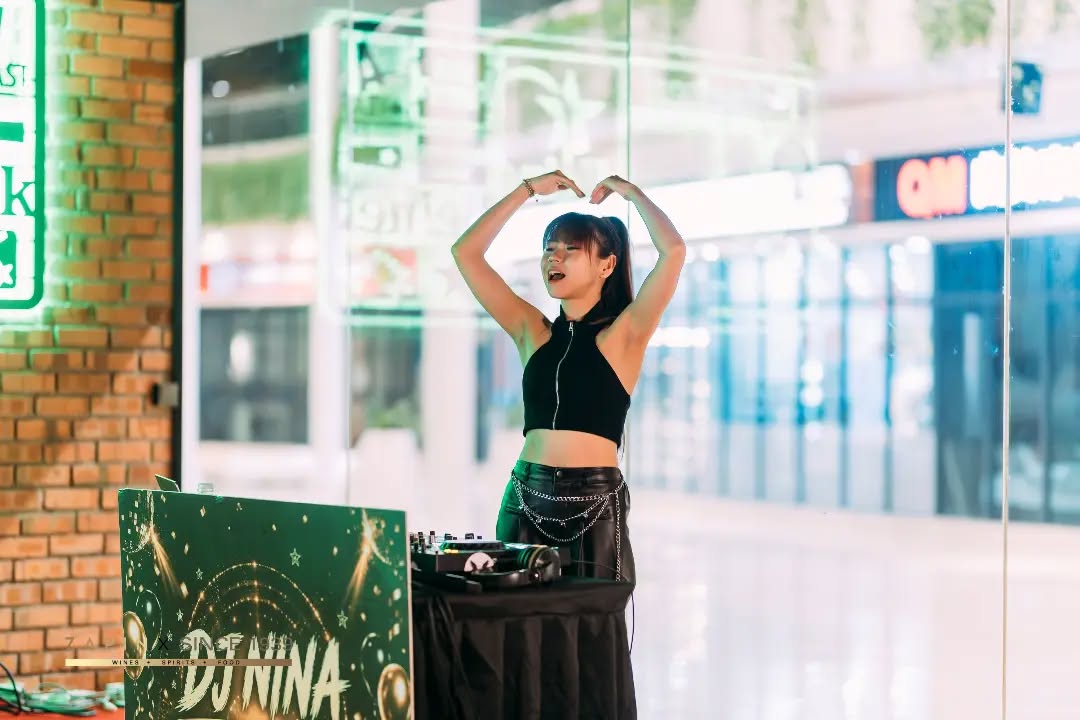 An image of a girl dj-ing